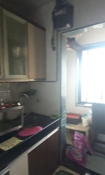 Kitchen in 3 BHK Apartment at RK Cosmos CHS, Thane West – for Rent