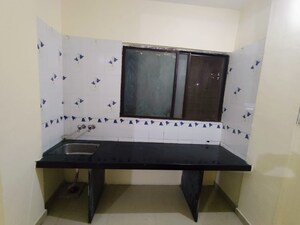 Kitchen in 2 BHK Apartment at Swapna Shilp Apartment, Wakad – for Rent