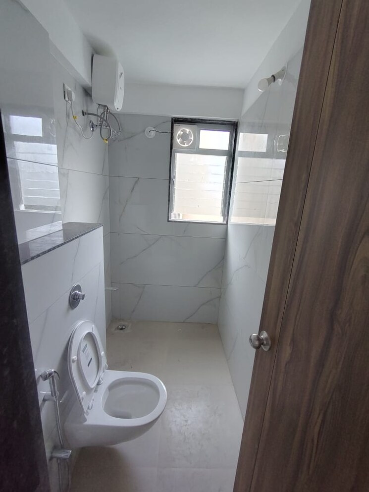 Bathroom, futuristic-the-miracle 3 Bedroom 1196 Sq.Ft. Apartment In Pimple Saudagar Pune 9666130