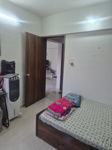 Living Room in 1 BHK Apartment at Divine Palm Springs, Wakad – for Rent