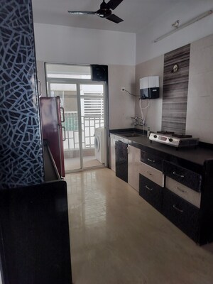 Kitchen in 2 BHK Apartment at Balaji Mesmero, Lohgaon – for Rent