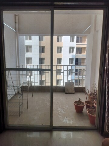 Room in 2 BHK Apartment at Balaji Mesmero, Lohgaon – for Rent
