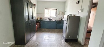 Kitchen in 2 BHK Apartment at Ganraj Estate CHS, Hadapsar – for Rent