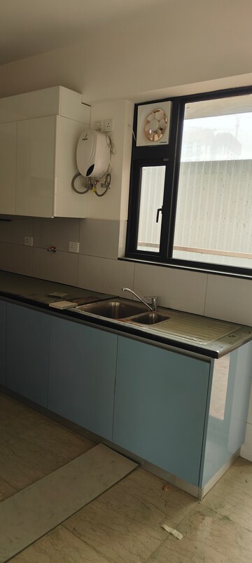 Kitchen in 4 BHK Apartment at Adani Samsara Vilasa, Sector 63 – for Sale