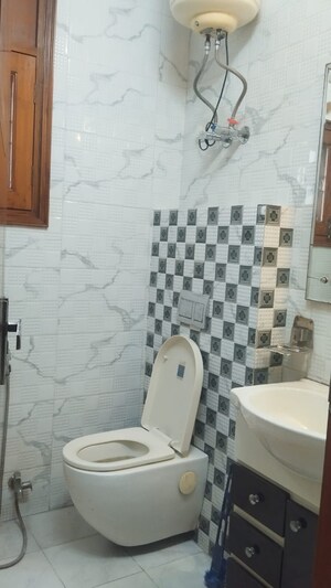 Bathroom in 3 BHK Builder Floor at Chittaranjan Park – for Rent