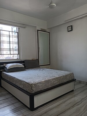 Bedroom in 2 BHK Apartment at Vijay Chambers, Girgaon – for Sale