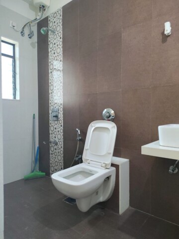 Bathroom in 3 BHK Apartment at Harmony Sky Suites, Ghodbunder Road – for Rent