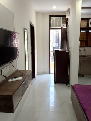 Living Room in Studio Builder Floor at Ansal Sushant Lok I, Sector 43 – for Rent