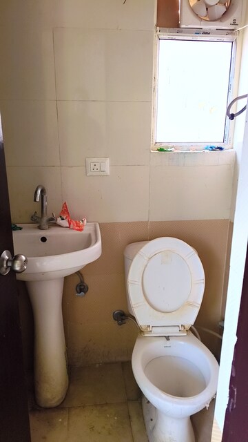 Bathroom in 2 BHK Apartment at Windsor Paradise 2, Raj Nagar Extension – for Sale