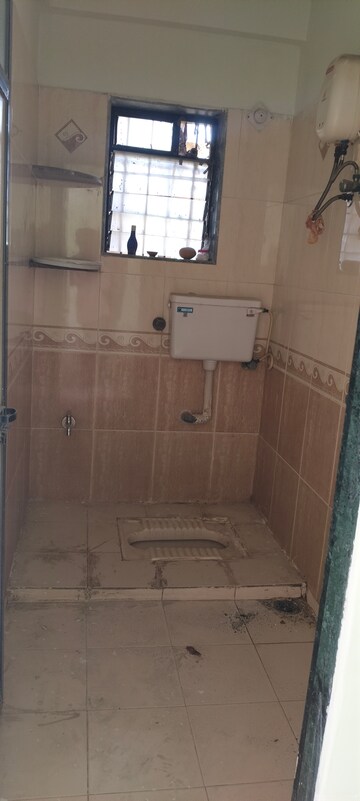 Bathroom in 1 RK Apartment at Shree Gurukrupa CHS, Seawoods – for Rent