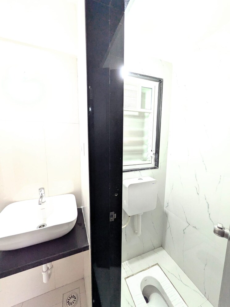 Bathroom, chandragan-dhankawadi 1 Bedroom 630 Sq.Ft. Apartment In Dhankawadi Pune 9666842