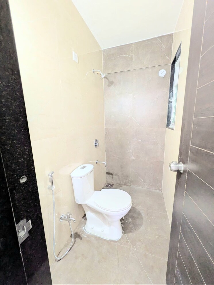 Bathroom, chandragan-dhankawadi 1 Bedroom 630 Sq.Ft. Apartment In Dhankawadi Pune 9666842