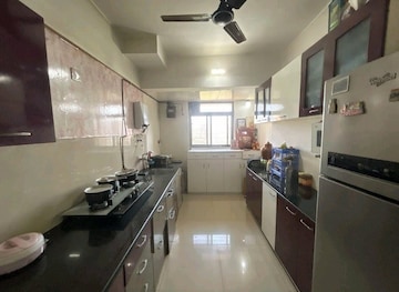 Kitchen in 2.5 BHK Apartment at Puranik City, Kasarvadavali – for Sale