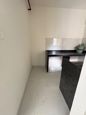 Kitchen in 2 BHK Apartment at Runwal Gardens, Dombivli East – for Rent