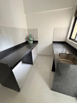 Kitchen in 2 BHK Apartment at Runwal Gardens, Dombivli East – for Rent