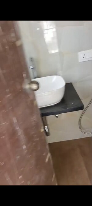 Bathroom in 2 BHK Apartment at Ashraj Krishna Bhuvan, Vile Parle East – for Rent