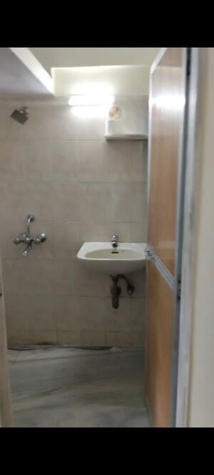 Bathroom in 2 BHK Apartment at Abhinav Apartment, Vile Parle East – for Rent