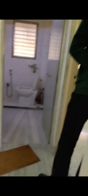 Bathroom in 2 BHK Apartment at Abhinav Apartment, Vile Parle East – for Rent