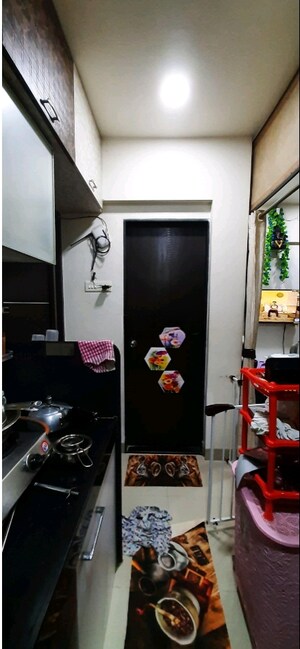 Furnished Amenities in 1 BHK Apartment at Swastik Residency Phase II CHS Ltd, Ghodbunder Road – for Sale