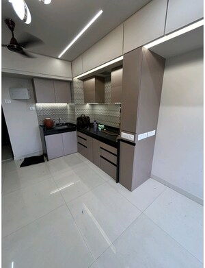 Kitchen in 2 BHK Apartment at Rustomjee Urbania, Thane West – for Rent