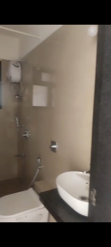 Bathroom in 2 BHK Apartment at Lakshmi Solitaire, Vile Parle East – for Rent