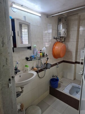 Bathroom in 2 BHK Apartment at Vile Parle East – for Rent