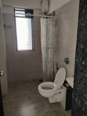 Bathroom in 2 BHK Apartment at Shree CHS Vile Parle, Vile Parle West – for Rent