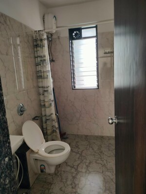 Bathroom in 2 BHK Apartment at Shree CHS Vile Parle, Vile Parle West – for Rent
