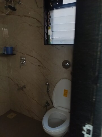 Bathroom in 2 BHK Apartment at Archis CHS, Vile Parle East – for Rent