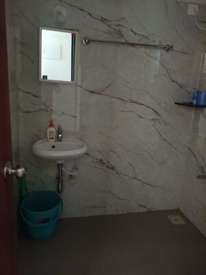 Bathroom in 2 BHK Apartment at Archis CHS, Vile Parle East – for Rent