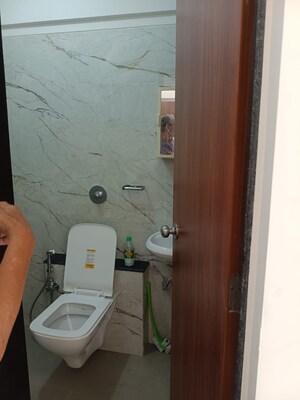 Bathroom in 2 BHK Apartment at Archis CHS, Vile Parle East – for Rent