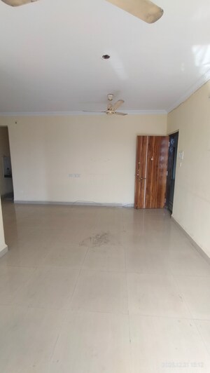 Living Room in 2 BHK Apartment at Yasho Deep Heights, Gothivali Village – for Rent