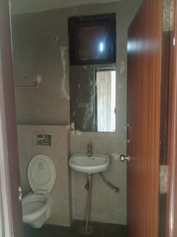 Bathroom in 4 BHK Apartment at Janata Colony – for Sale