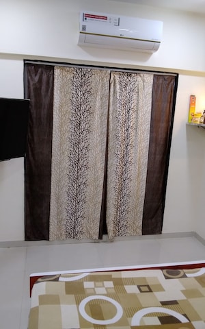 Bedroom in 2 BHK Apartment at Lodha Amara, Kolshet Road – for Rent