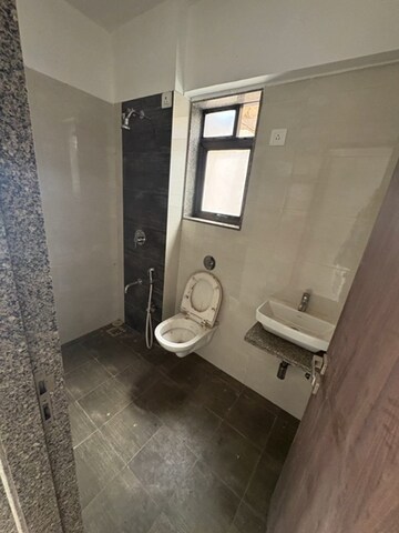 Bathroom in 3 BHK Apartment at Neminath Swagat CHSL, Andheri West – for Rent