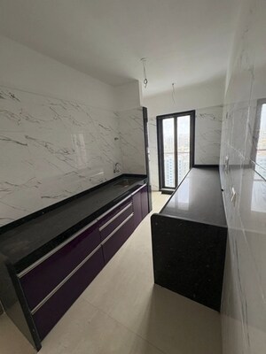 Kitchen in 3 BHK Apartment at Neminath Swagat CHSL, Andheri West – for Rent