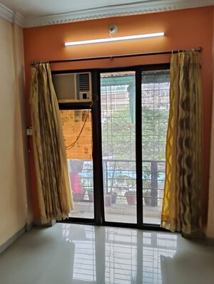 Room in 2 BHK Apartment at Shraddha Tower, Kandivali East – for Rent