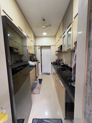 Kitchen in 3 BHK Apartment at Transcon Triumph Tower, Andheri West – for Rent