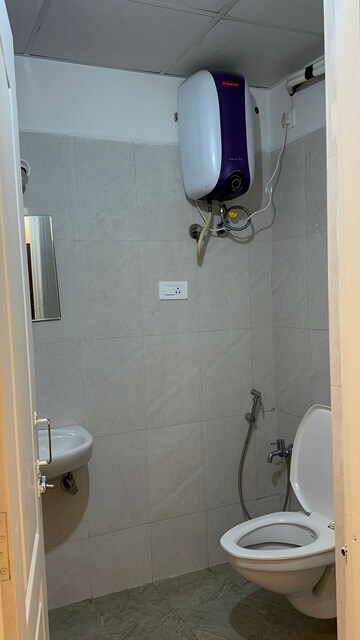 Bathroom in 3 BHK Apartment at Silpa RV dharmista, Miyapur – for Rent