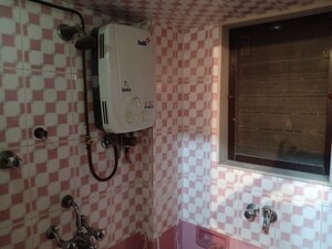 Bathroom in 1 BHK Apartment at The Kamal Sagar CHS, Bhandup East – for Rent