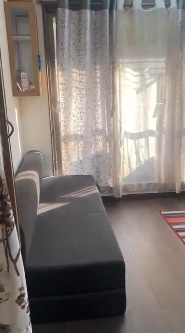 Living Room in 2 BHK Apartment at New Ambivali, Andheri West – for Rent