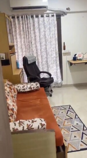 Living Room in 2 BHK Apartment at New Ambivali, Andheri West – for Rent