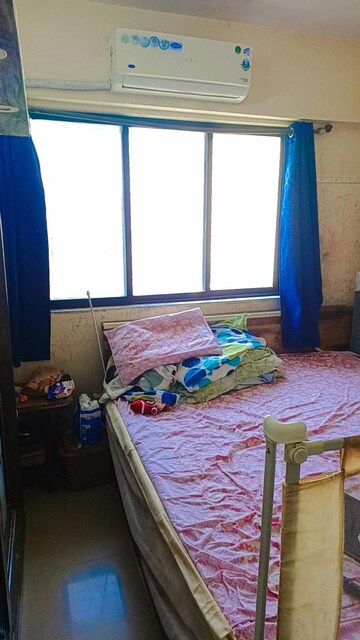 Bedroom in 1 BHK Apartment at Pushpanjali Heights, Owale – for Sale