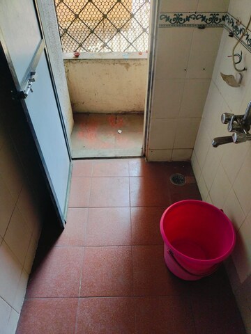 Bathroom in 1 BHK Apartment at Cosmos Residancy, Kavesar – for Rent