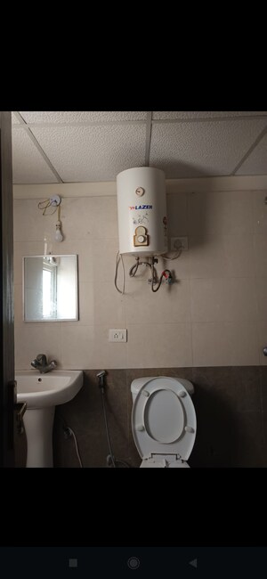 Bathroom in 3 BHK Apartment at Aims Golf City, Sector 75 – for Rent