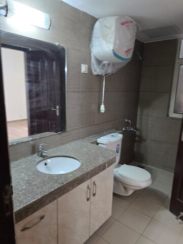 Bathroom in 4 BHK Apartment at 3C Lotus Panache, Sector 110 – for Rent