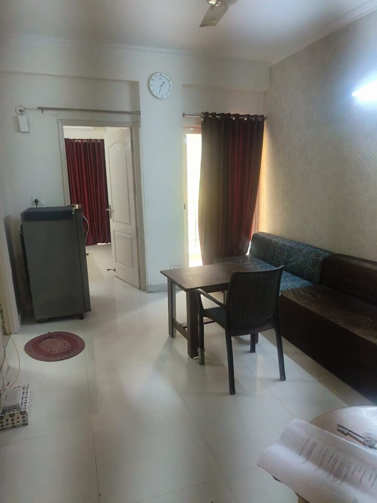 Living Room, maxblis-grand-wellington 1 Bedroom 615 Sq.Ft. Apartment In Sector 75 Noida 9667858