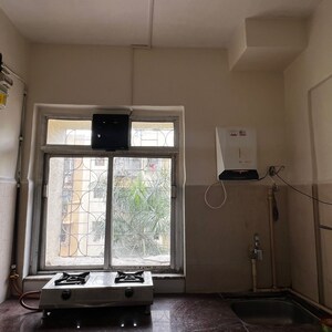 Kitchen in 2 BHK Apartment at Sundervan Crystal CHS, Shashtri Nagar – for Rent