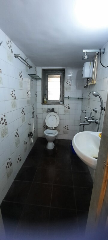 Bathroom in 2 BHK Apartment at Sheffield Towers, Andheri West – for Rent