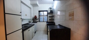 Kitchen in 2 BHK Apartment at Sheffield Towers, Andheri West – for Rent